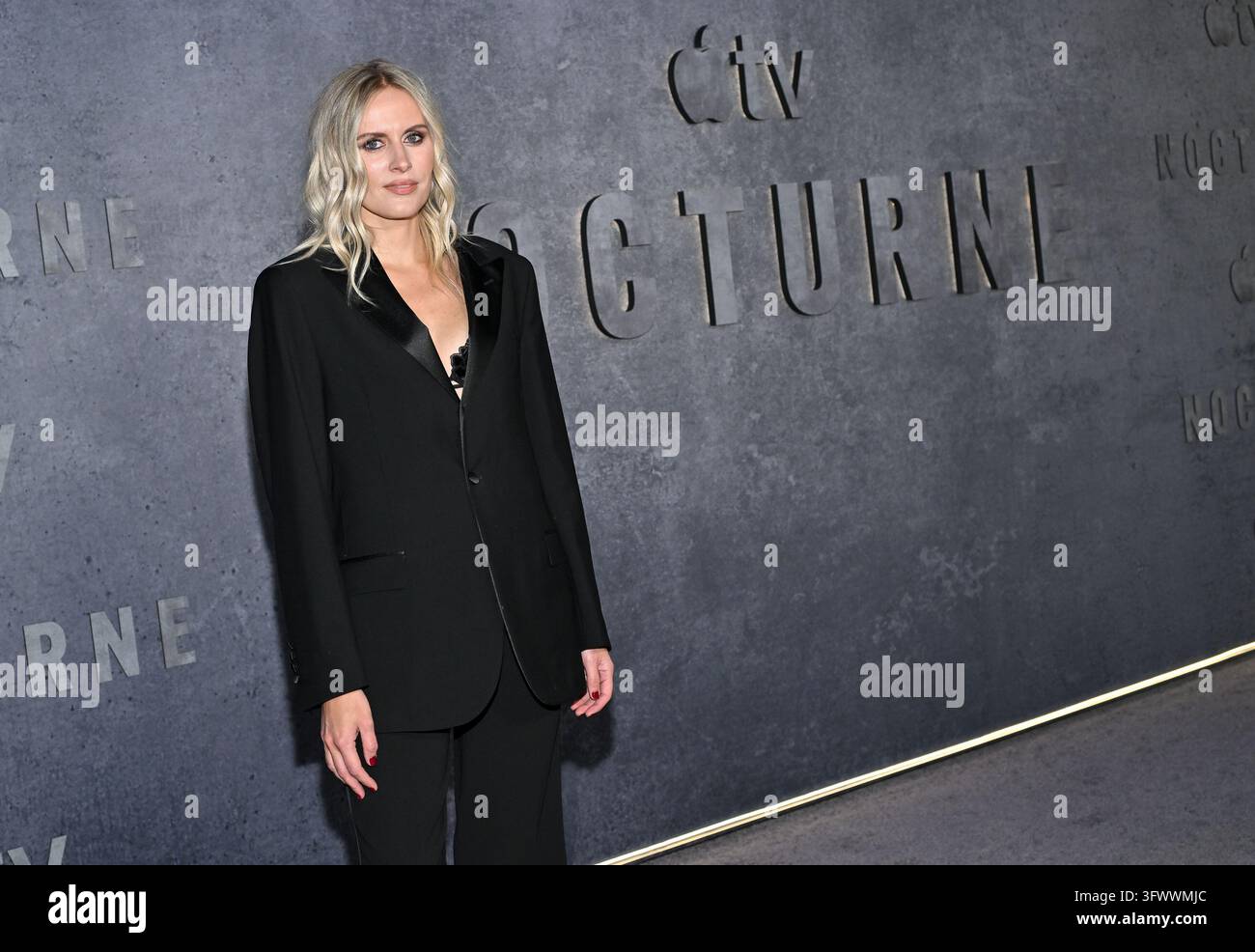 Anne Windsland arrives at the premiere of 