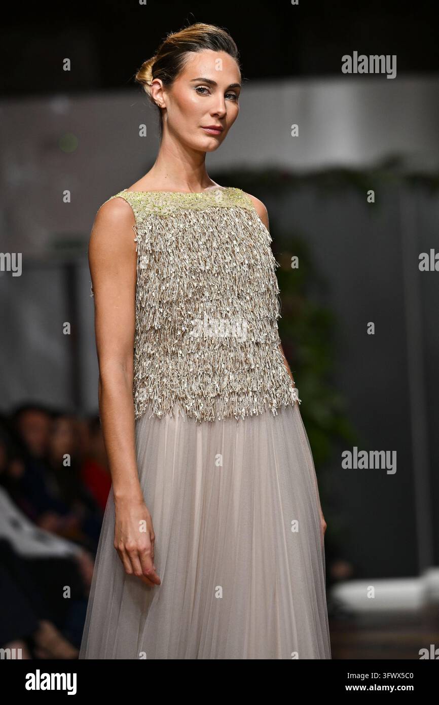A model parades with design Jesus Segado during the ATELIER COUTURE ...