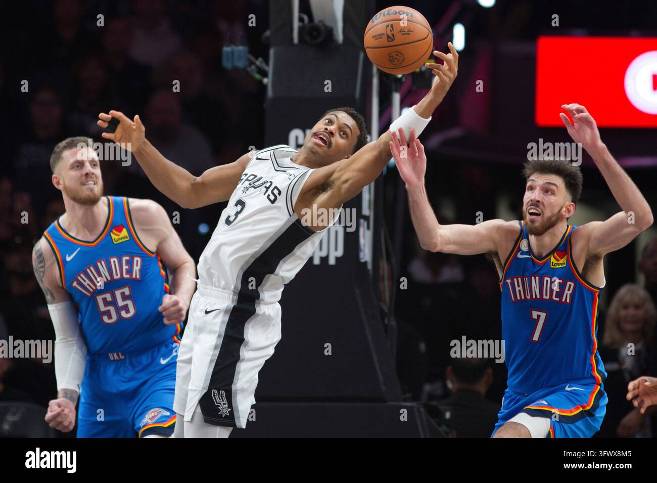 Thgunder Vector San Antonio Spurs guard Keldon Johnson (3) and Oklahoma City Thunder ...