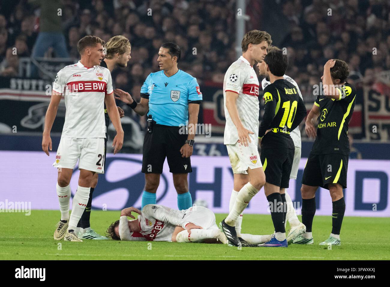 Referee [referee] Serdar Goezuebueyuek (NED) shows Morten Hjulmand ...