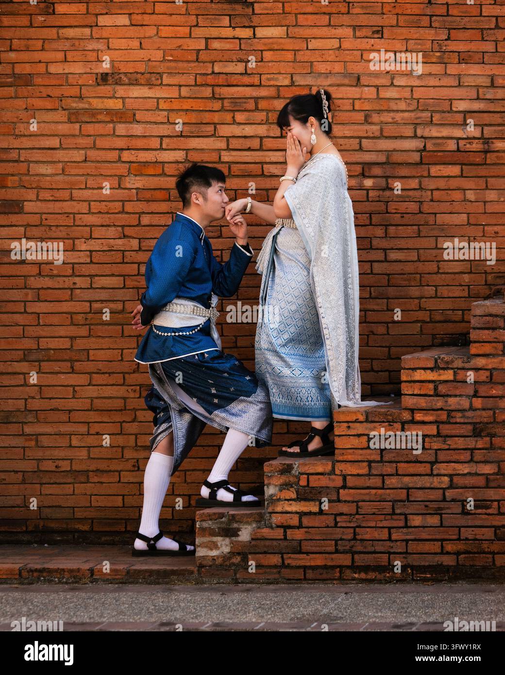 Chiang Mai, Thailand - January 17, 2026: A man and woman dressed in ...