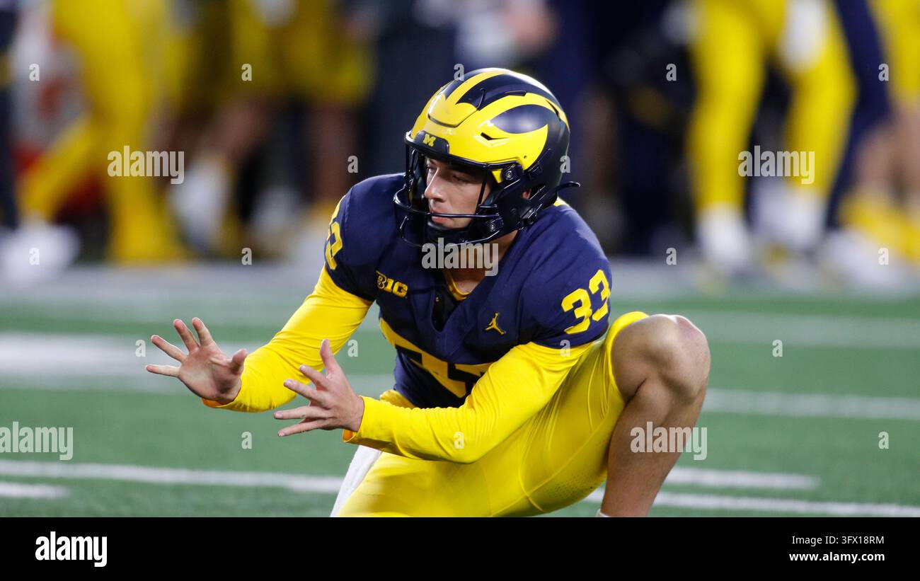 Michigan's Cam Brown plays during an NCAA football game on Saturday ...