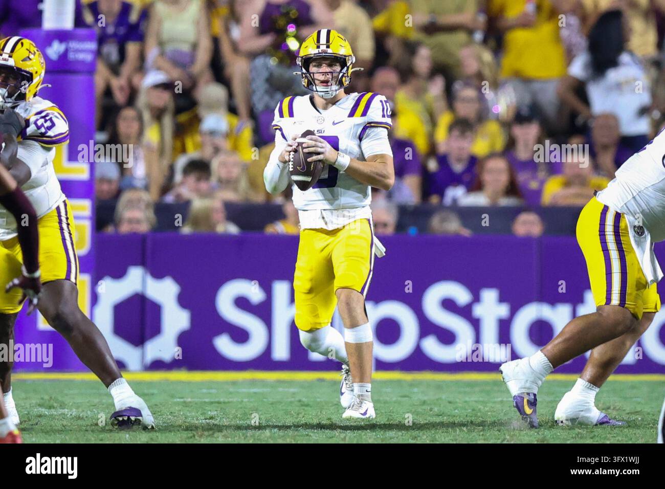 LSU Tigers quarterback Sam Leavitt (10) looks downfield for an open ...