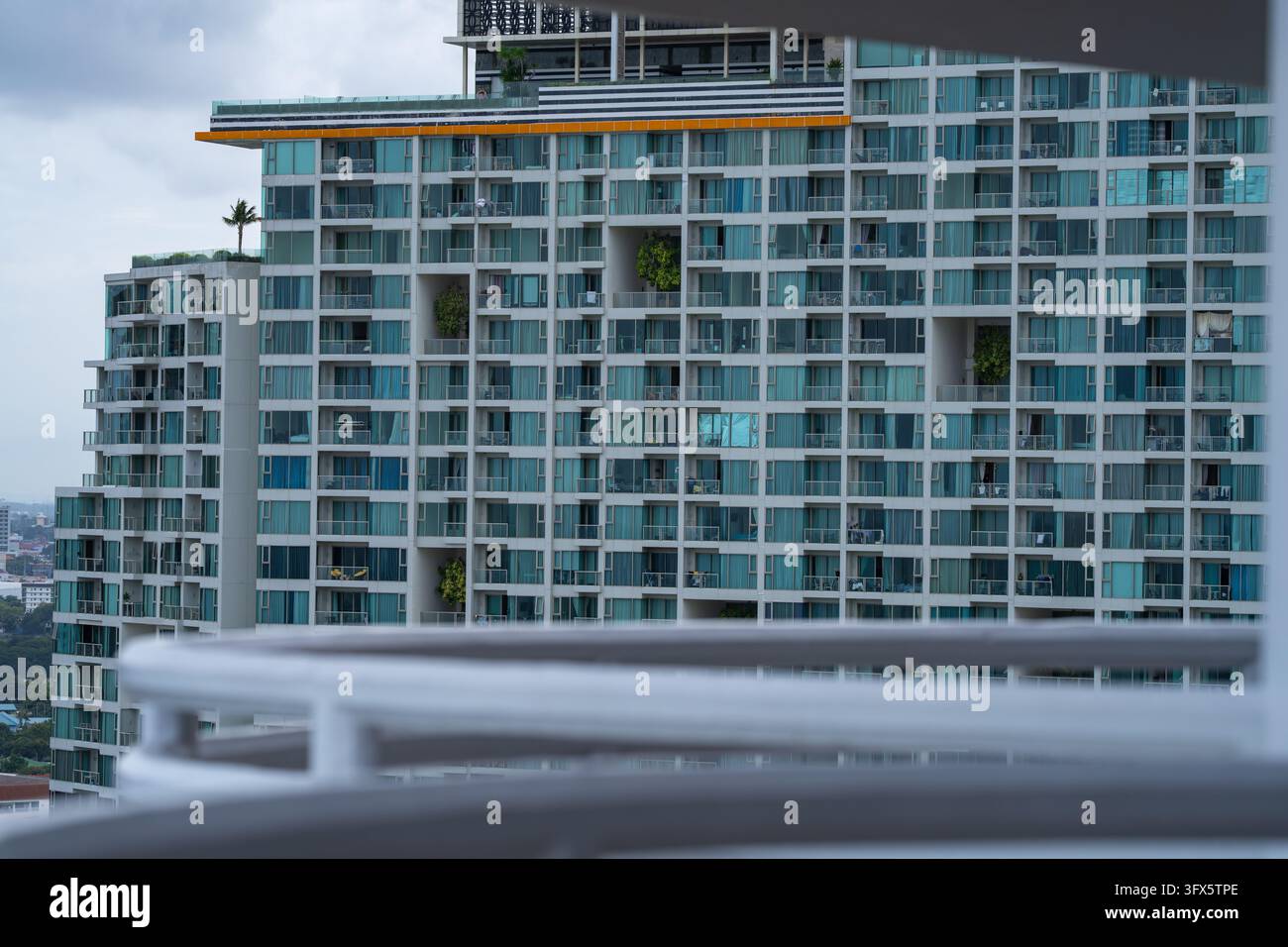 Residential Vector Graphics Modern high rise apartment building with rows of balconies and large ...