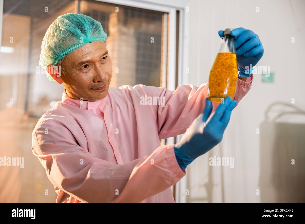 Factory Work Vector A diligent worker in a beverage factory checks Basil seed products on ...
