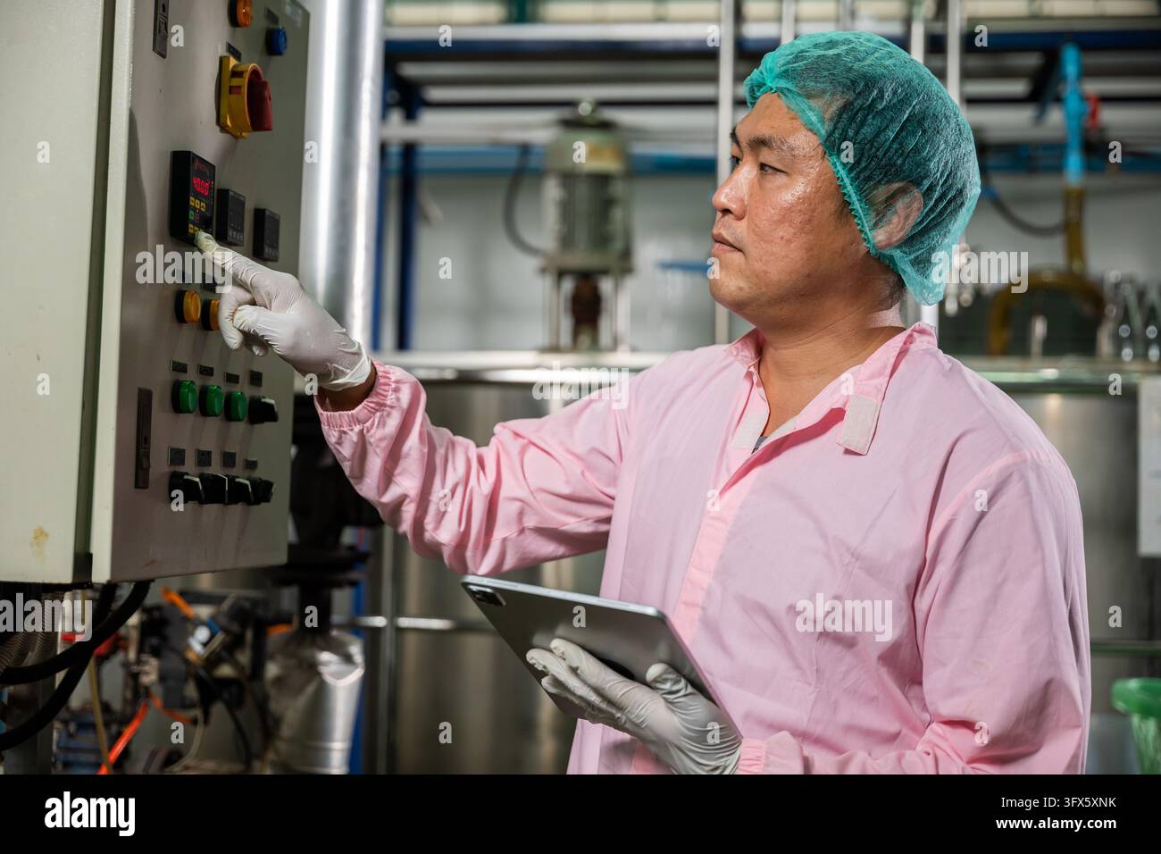 Factory Work Vector Worker utilizes tablet in beverage factory operations while engineer ...