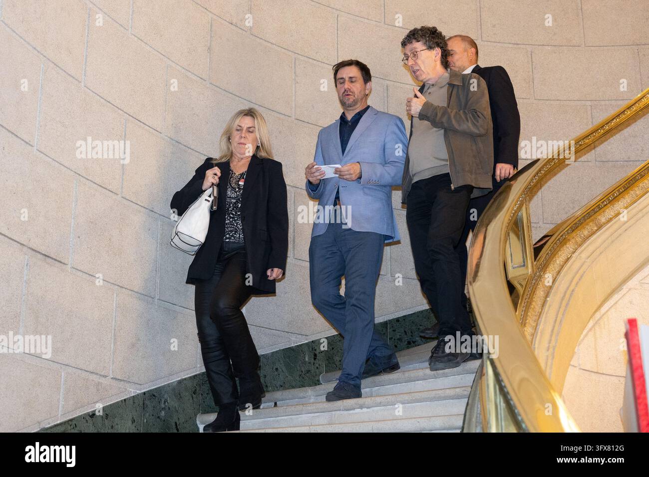 Toni Comín (centre), former regional minister and MEP-elect for Junts ...