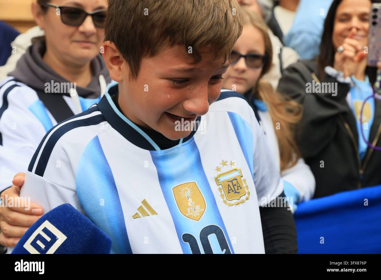 Messi fans crying after getting an autograph on their shirt, on October ...