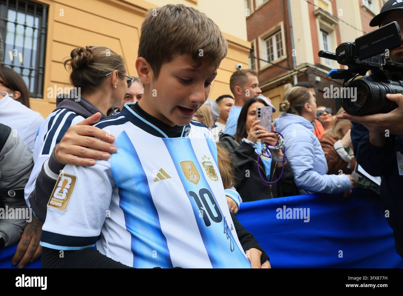 Messi fans crying after getting an autograph on their shirt, on October ...