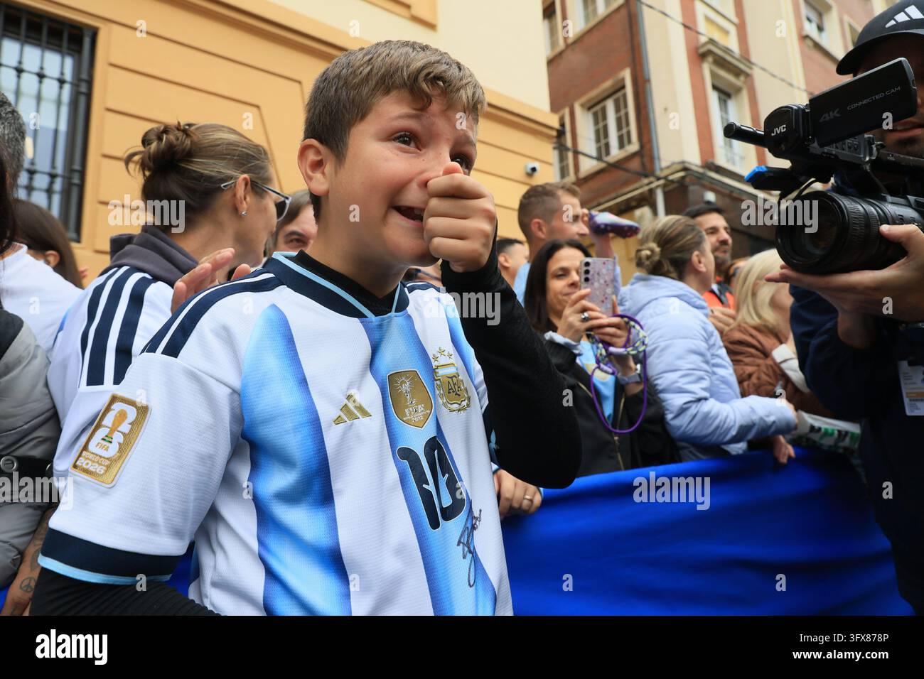 Messi fans crying after getting an autograph on their shirt, on October ...