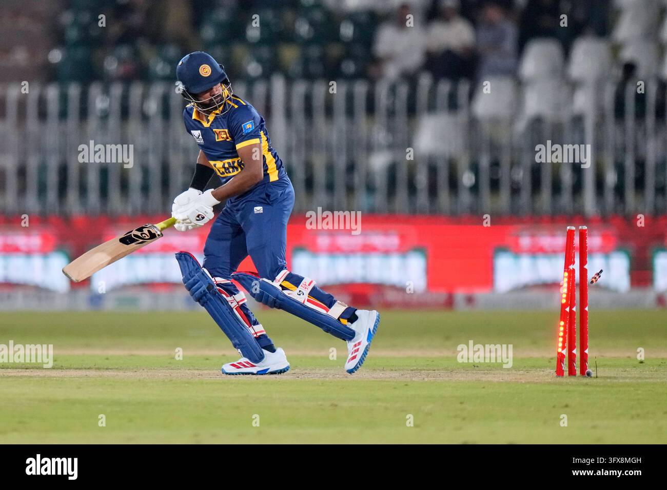 Wikets Vector Sri Lanka's Kamindu Mendis looks to wickets after his dismissal during ...