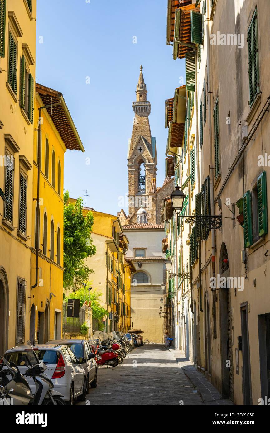 View of a street with Church Santa Croce in Florence, tower, UNESCO ...