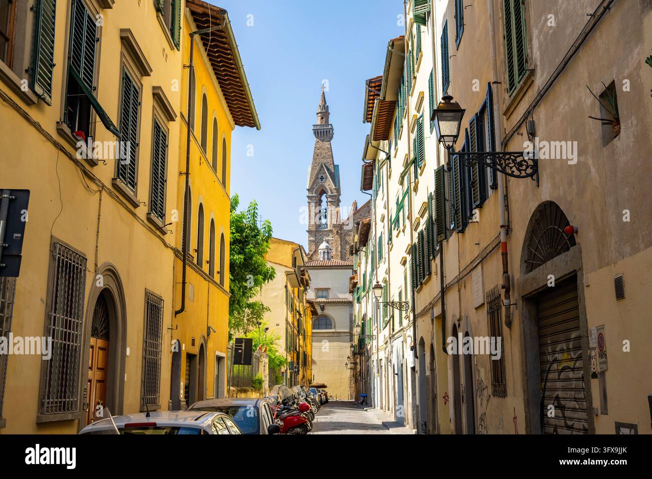 View of a street with Church Santa Croce in Florence, tower, UNESCO ...