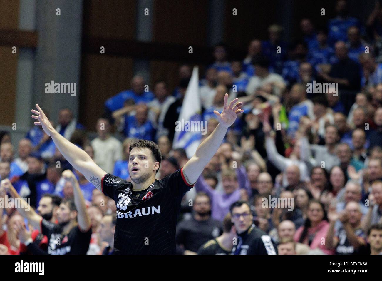 Cheer Chant Vector Aaron Mensing of MT Melsungen cheers during the EHF Champions League ...