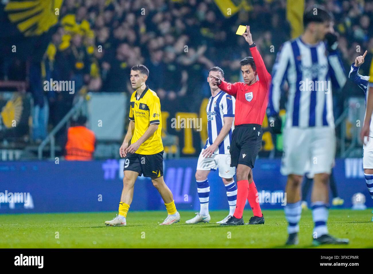 Lillestrøm 20261022. Referee Mohammad Al-Emara gives a yellow card ...