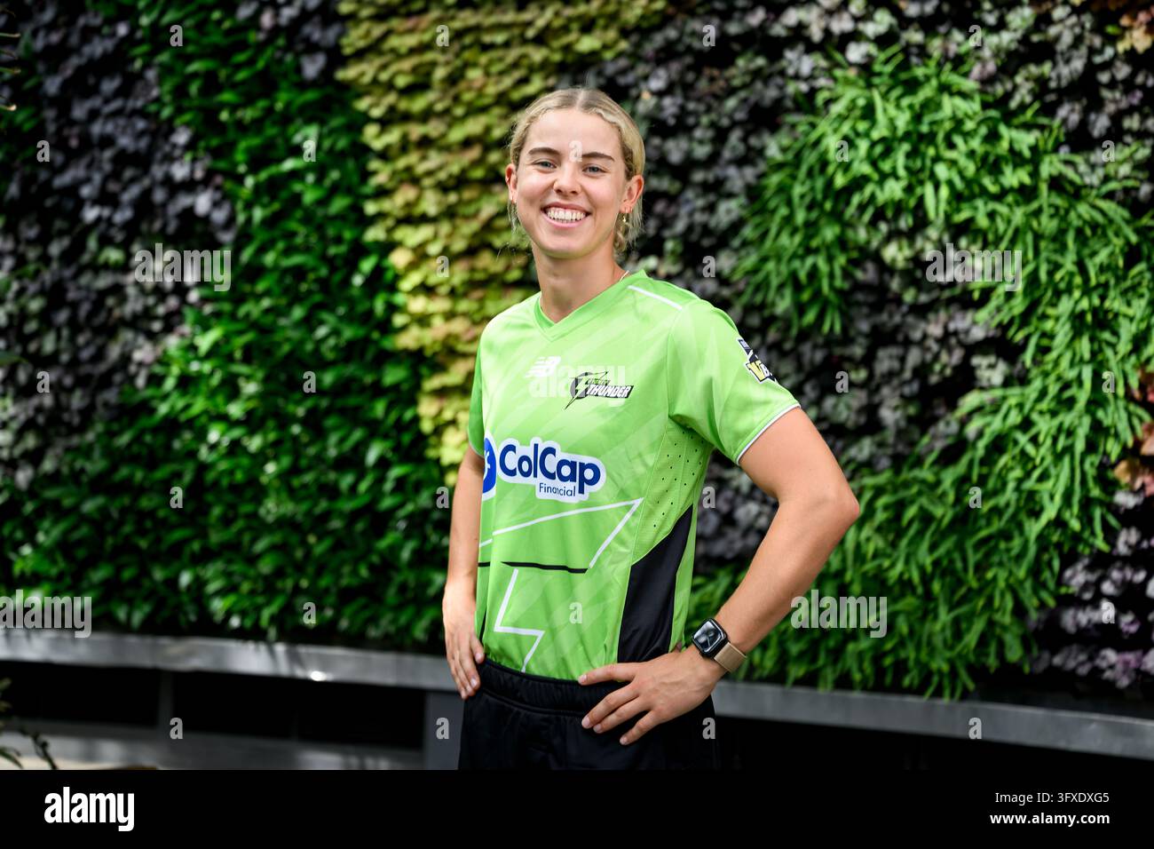 Thgunder Vector Phoebe Litchfield of the Sydney Thunder poses for a photograph during ...