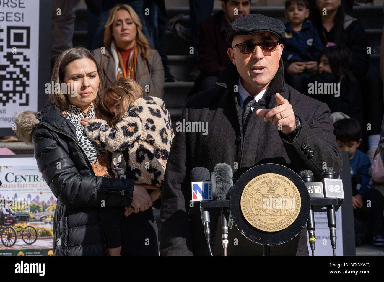 Second-generation horse carriage driver Frank Riccobono speaks at a ...