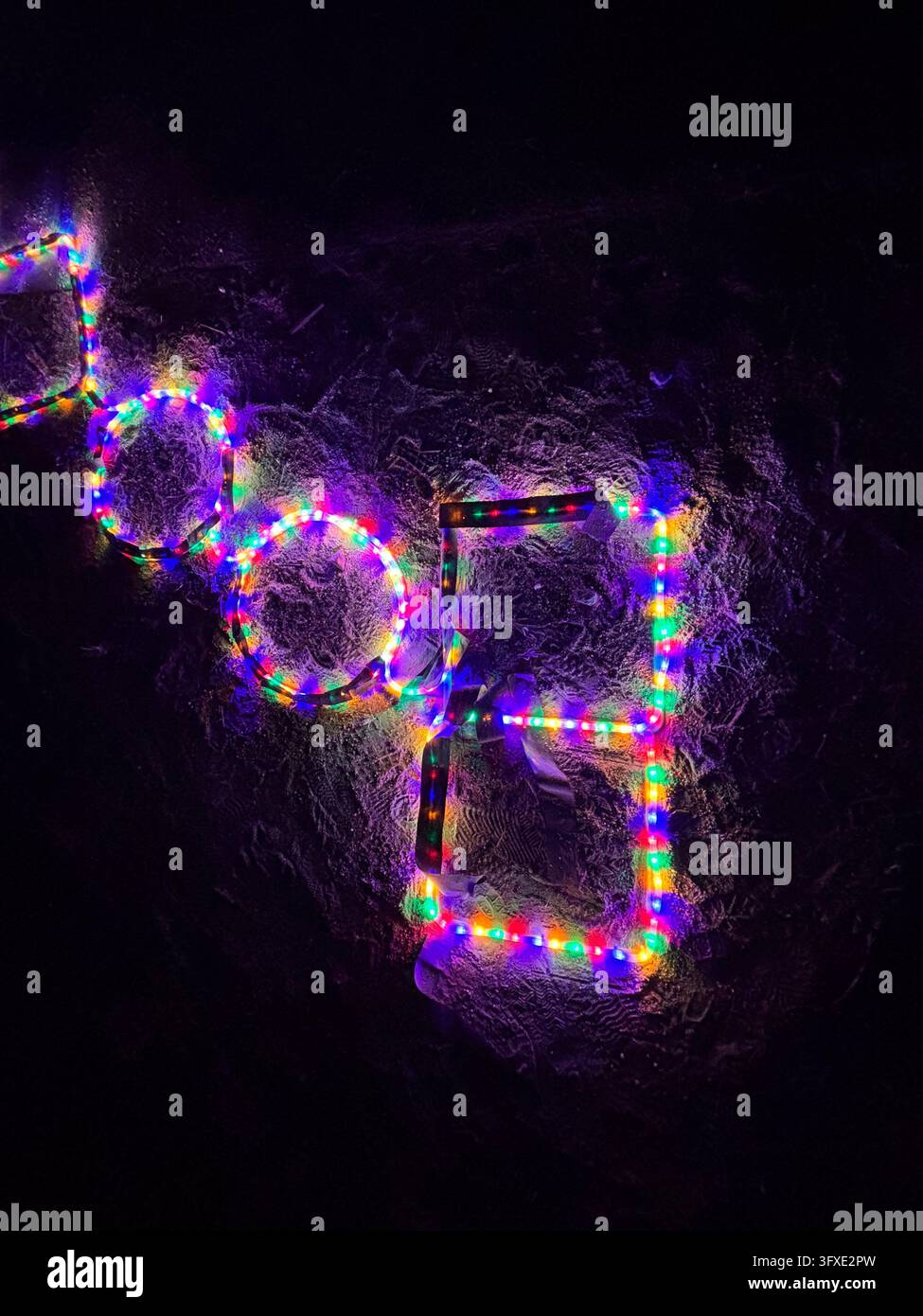 Close-up of a neon hopscotch art installation displayed at a limited-time festive event held in Maizuru Park, Fukuoka, Japan. - Smartphone Captured Stock Image