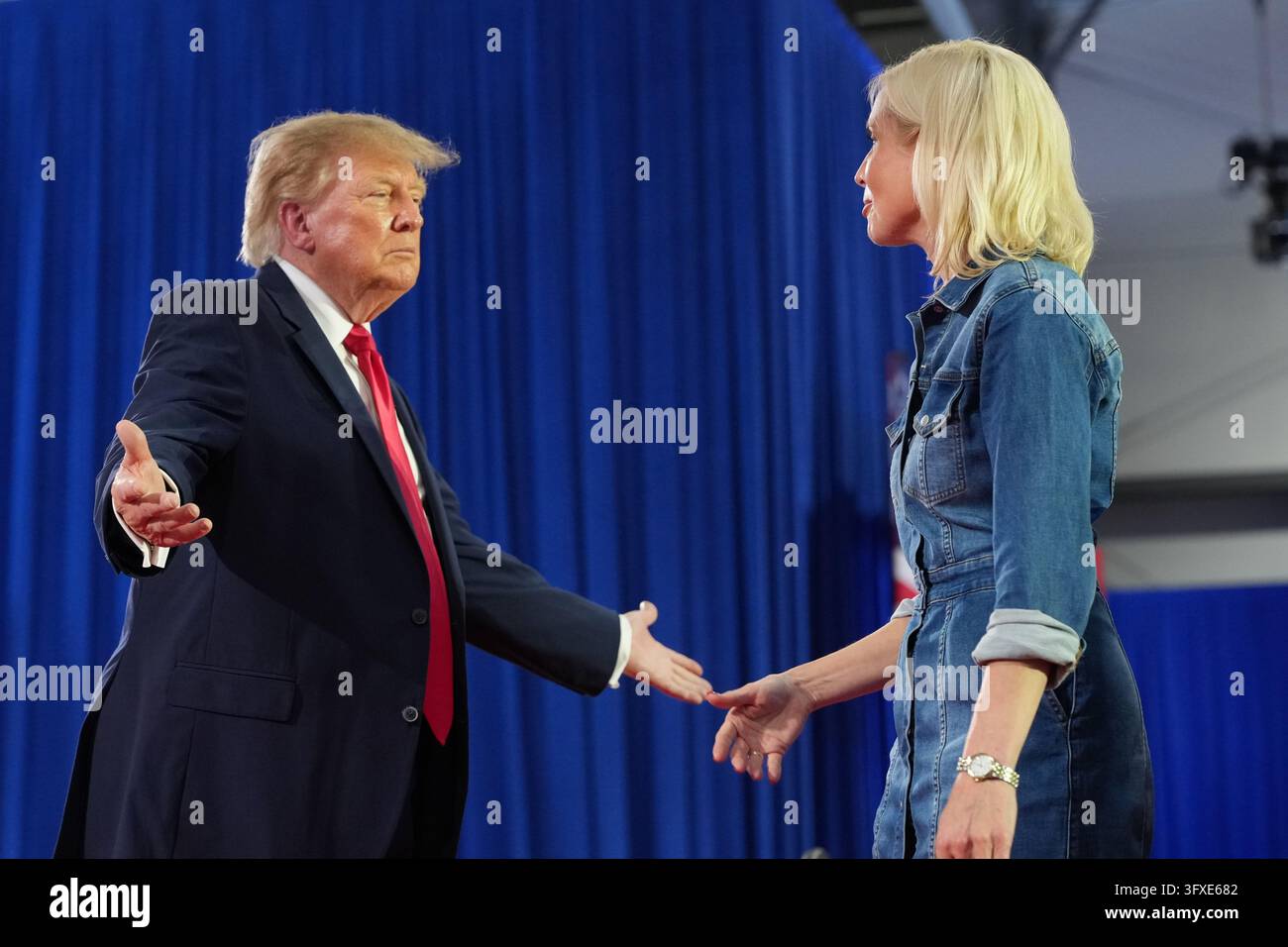 Trump Rally Iowa President Donald Trump greets Iowa U.S. Senate candidate Rep. Ashley ...