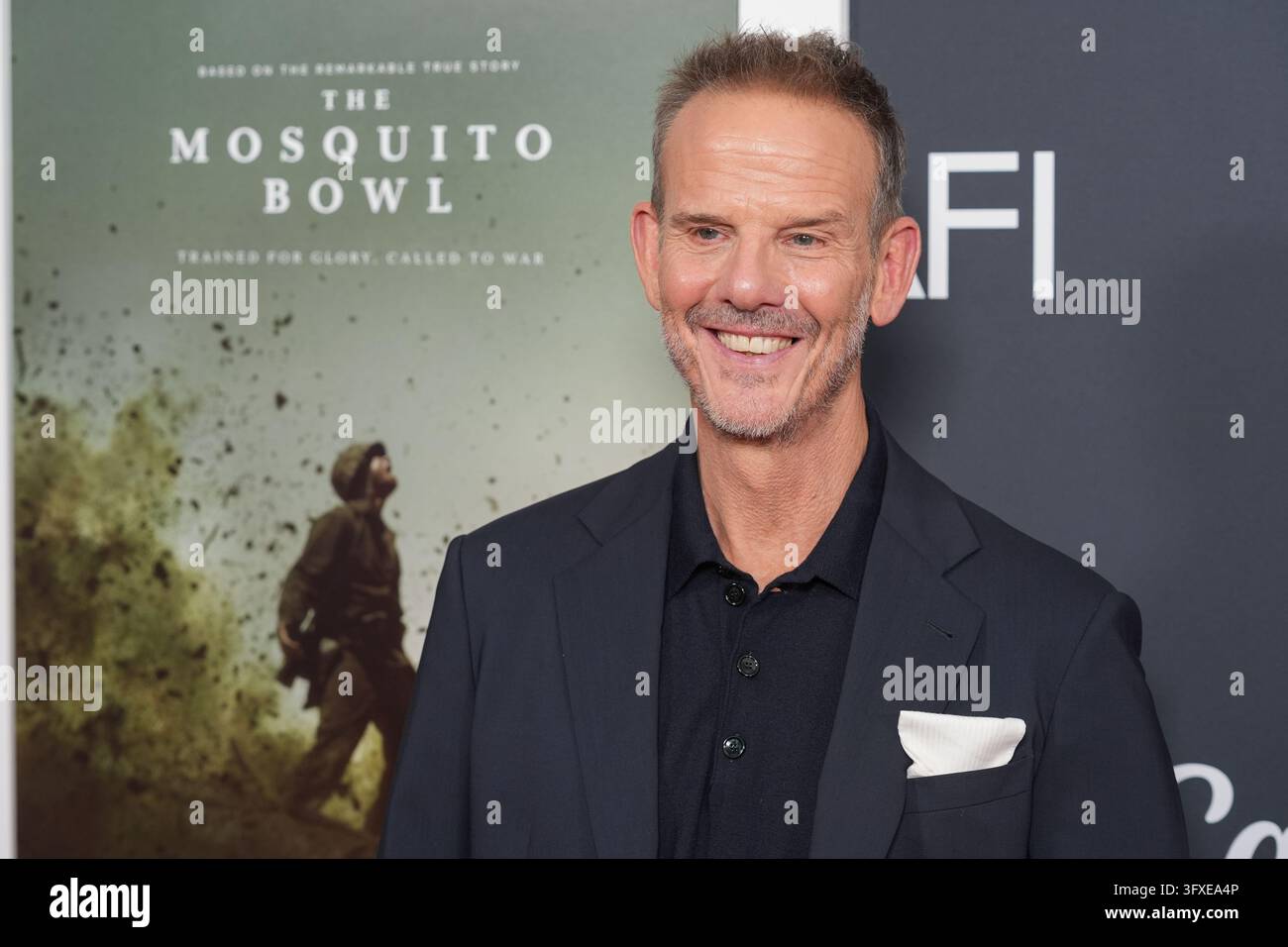 Peter Berg arrives at the AFI Fest premiere of 