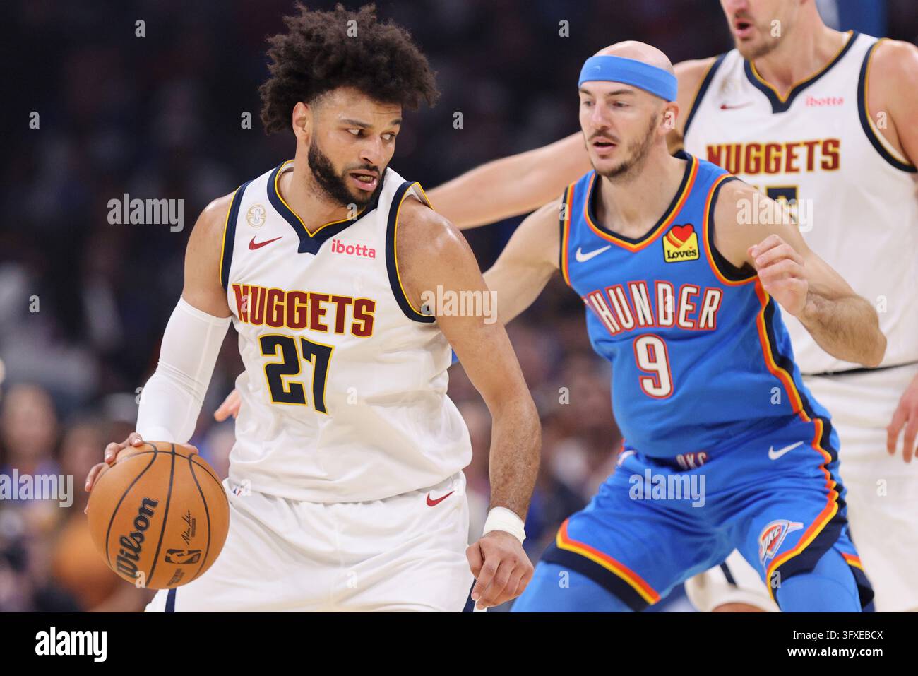 Thgunder Vector Denver Nuggets guard Jamal Murray (27) handles the ball against ...