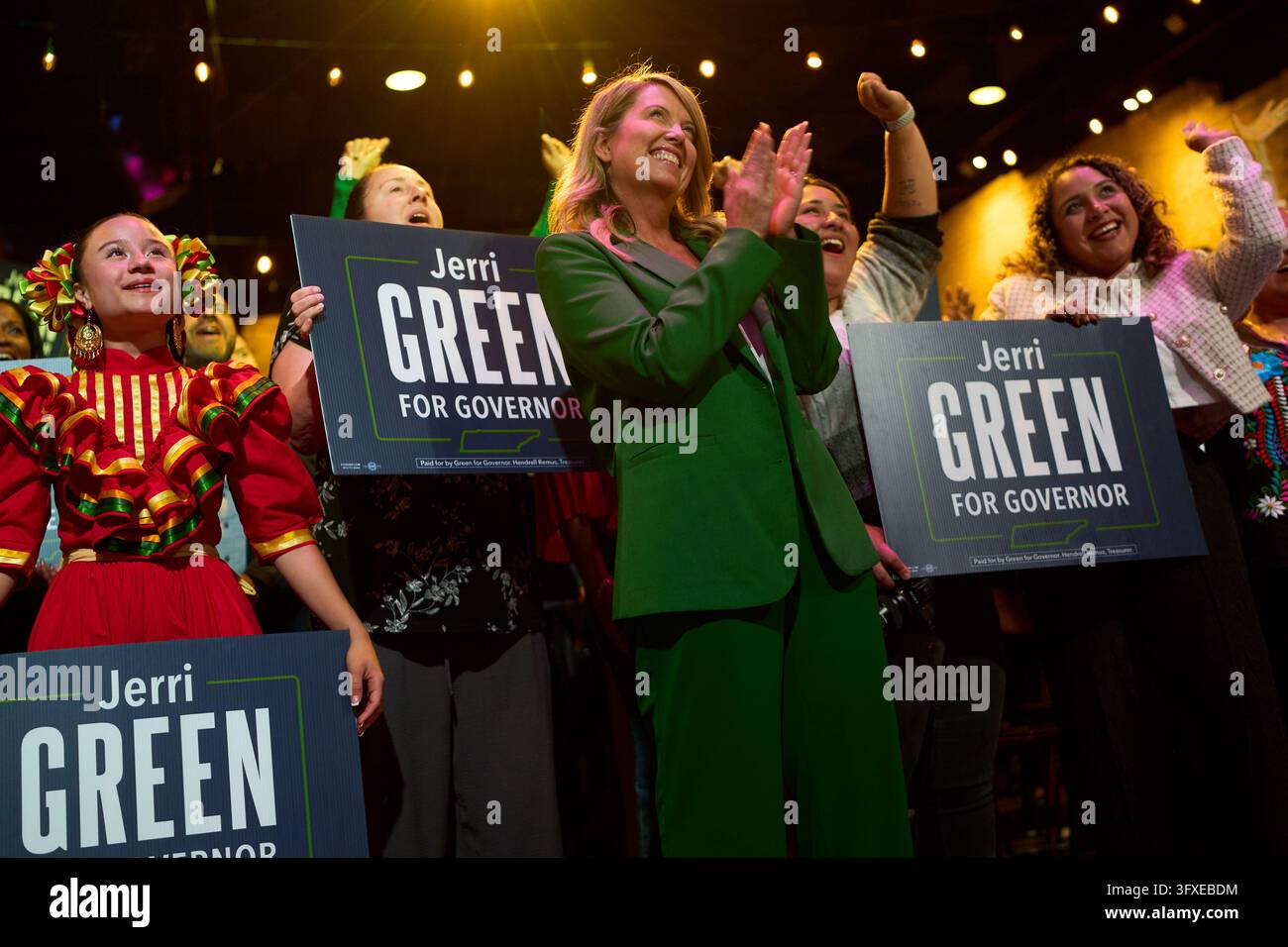 Cheer Chant Vector Jerri Green, Democratic candidate for governor, center, cheers with ...