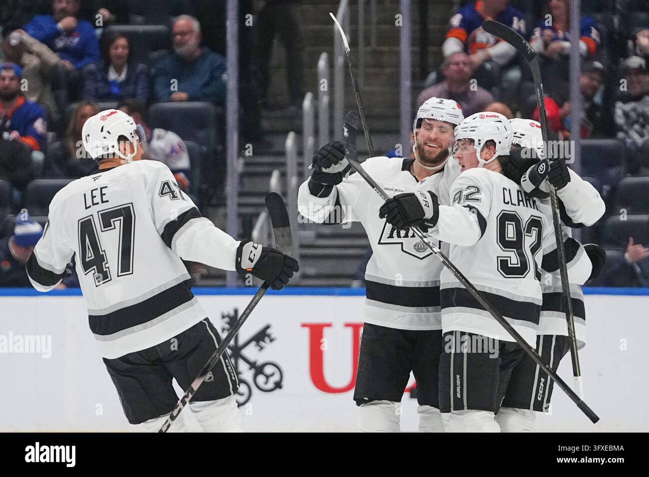 Los Angeles Kings' Brandt Clarke (92) celebrates with Adrian Kempe (9 ...