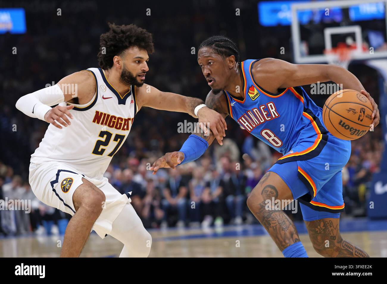 Thgunder Vector Oklahoma City Thunder guard Jalen Williams (8) drives against Denver ...
