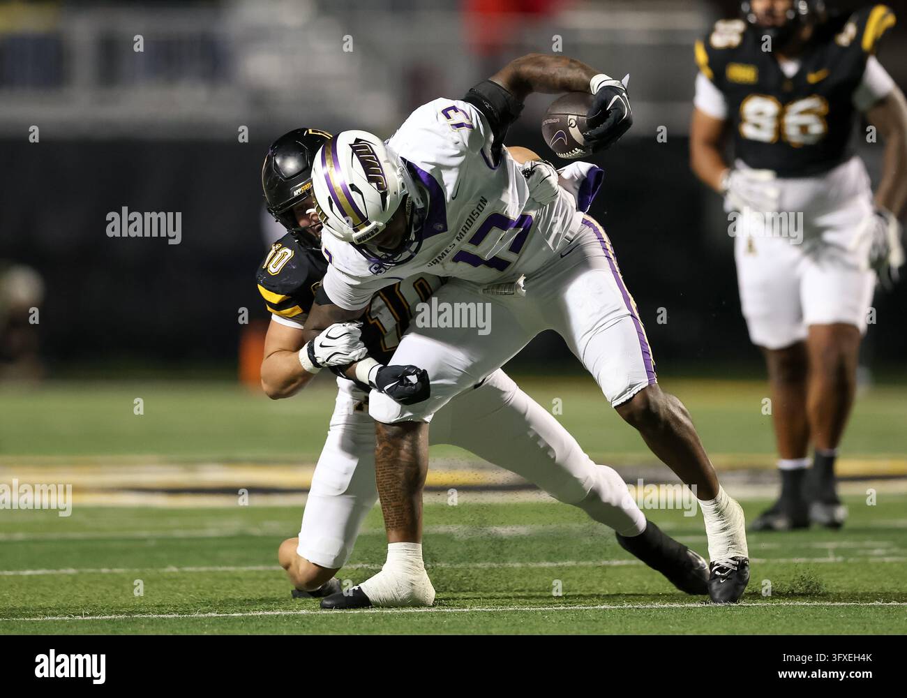 October 22, 2026: James Madison Dukes KD Mosley (13) is tackled by App ...