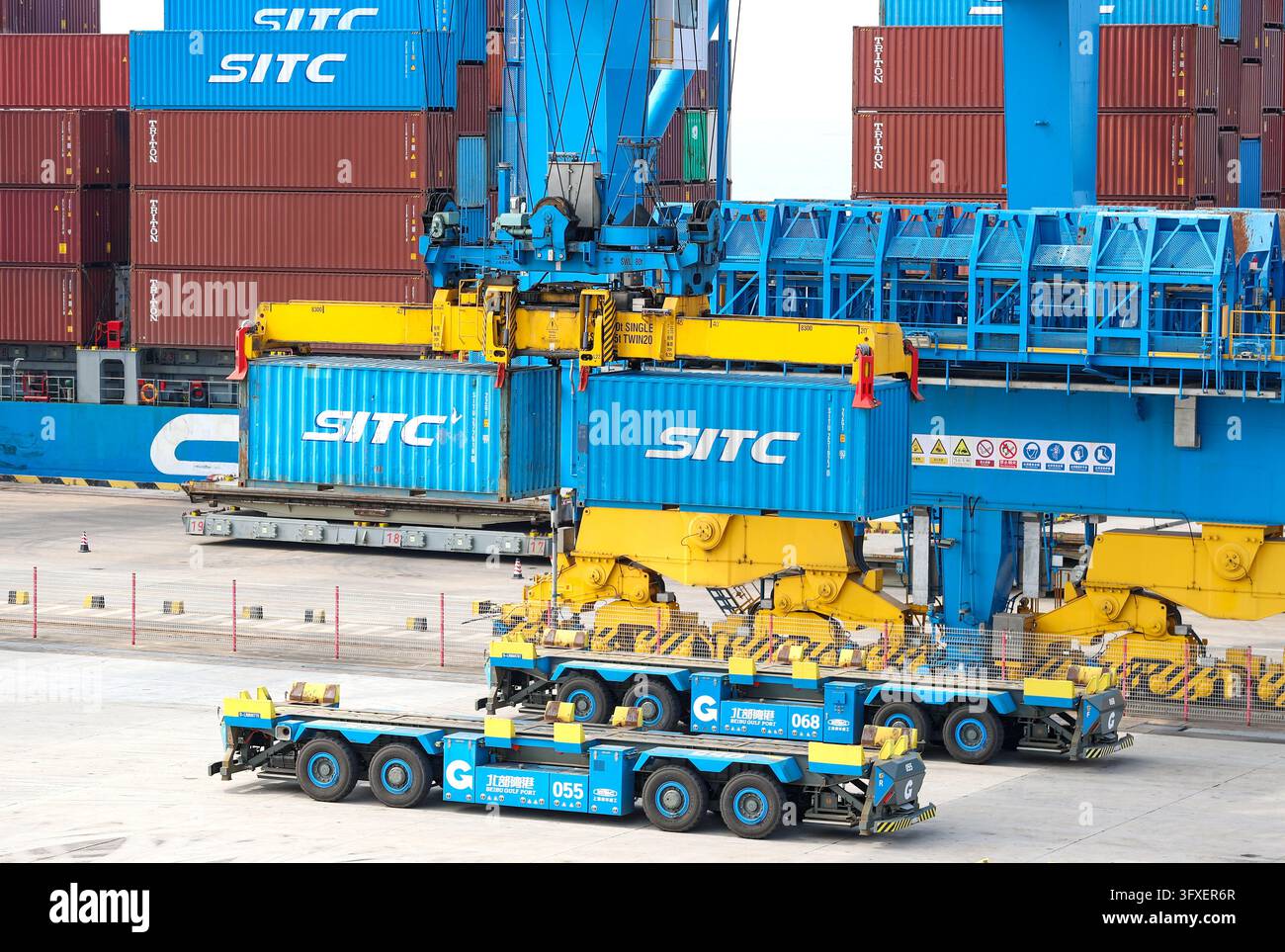 Automated transporters work at a container terminal in Qinzhou Port in ...