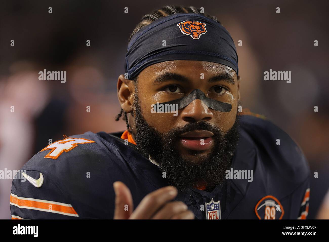 Chicago Bears running back D'Andre Swift (4) looks on from the bench ...