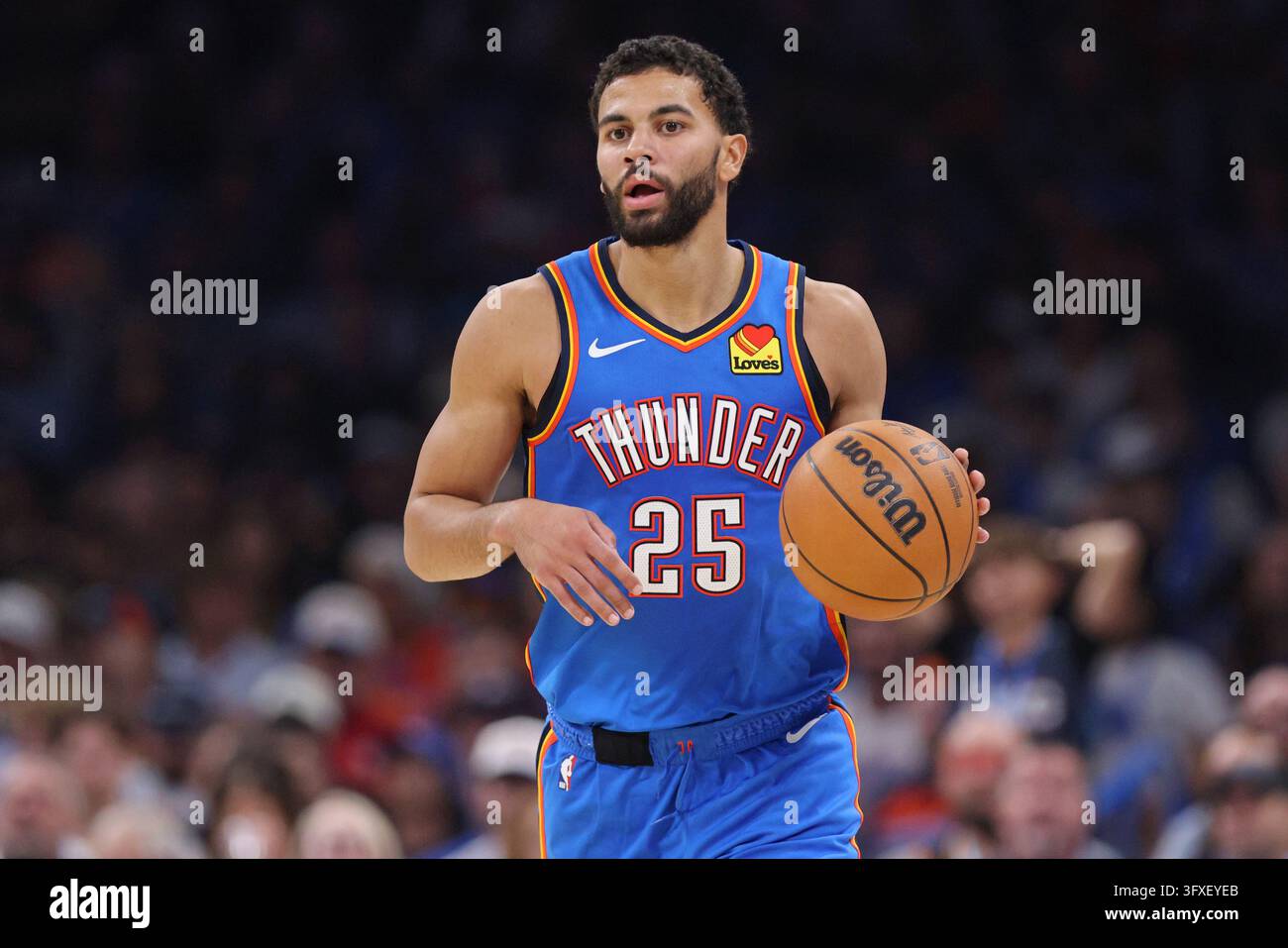 Thgunder Vector Oklahoma City Thunder guard Ajay Mitchell handles the ball during the ...