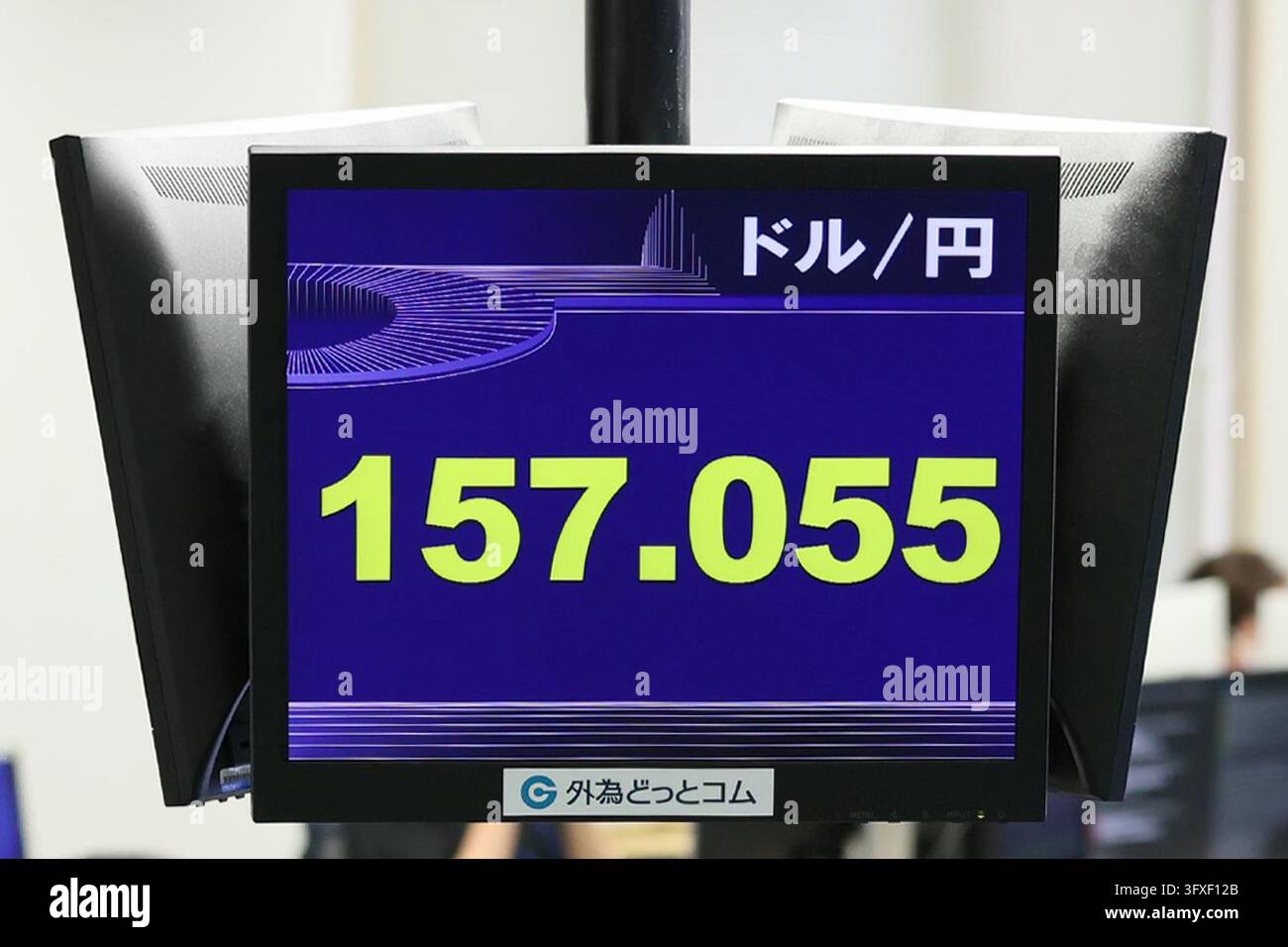 An electronic board displays the Japanese yen's exchange rate against ...