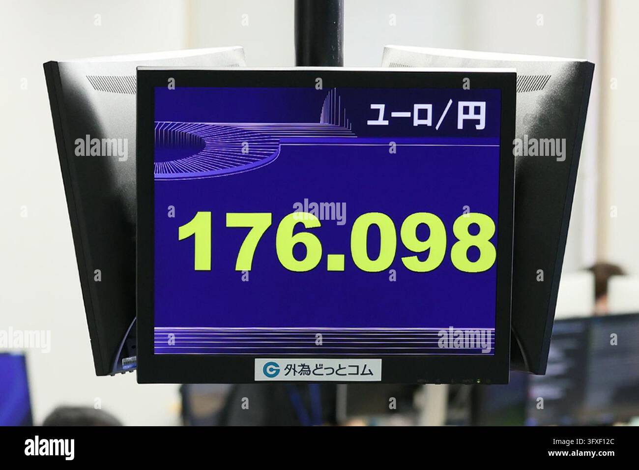 An electronic board displays the Japanese yen's exchange rate against ...