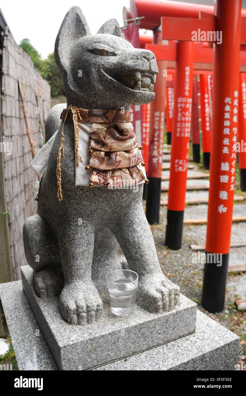 Guardian Vector Traditional stone kitsune fox guardian statue wearing a decorative bib ...