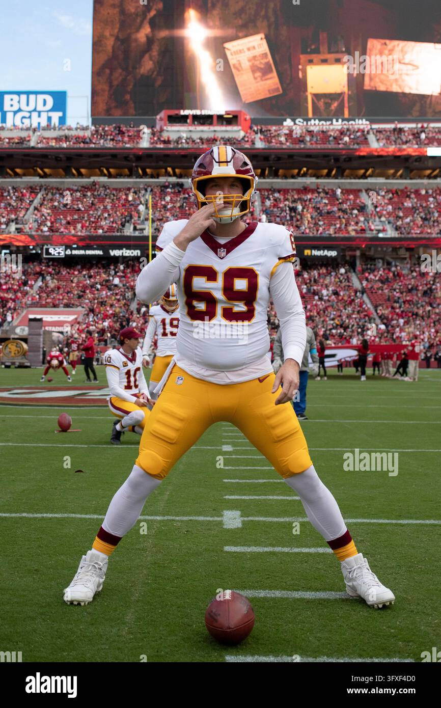 Washington Commanders New Roster Washington Commanders long snapper Tyler Ott (69) warms up during an ...
