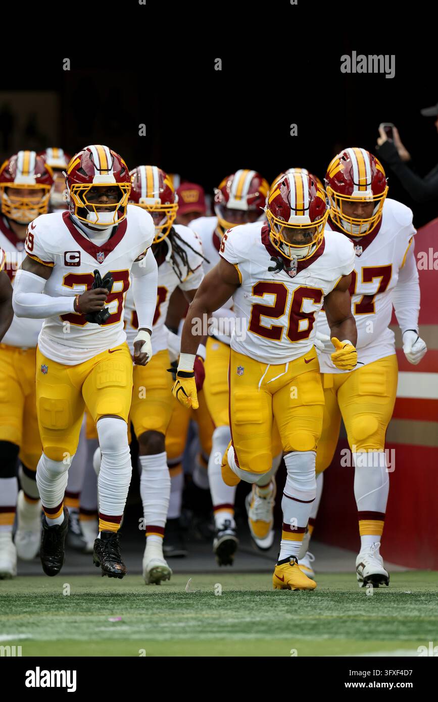 Washington Commanders running back Jeremy McNichols (26) leads the team ...