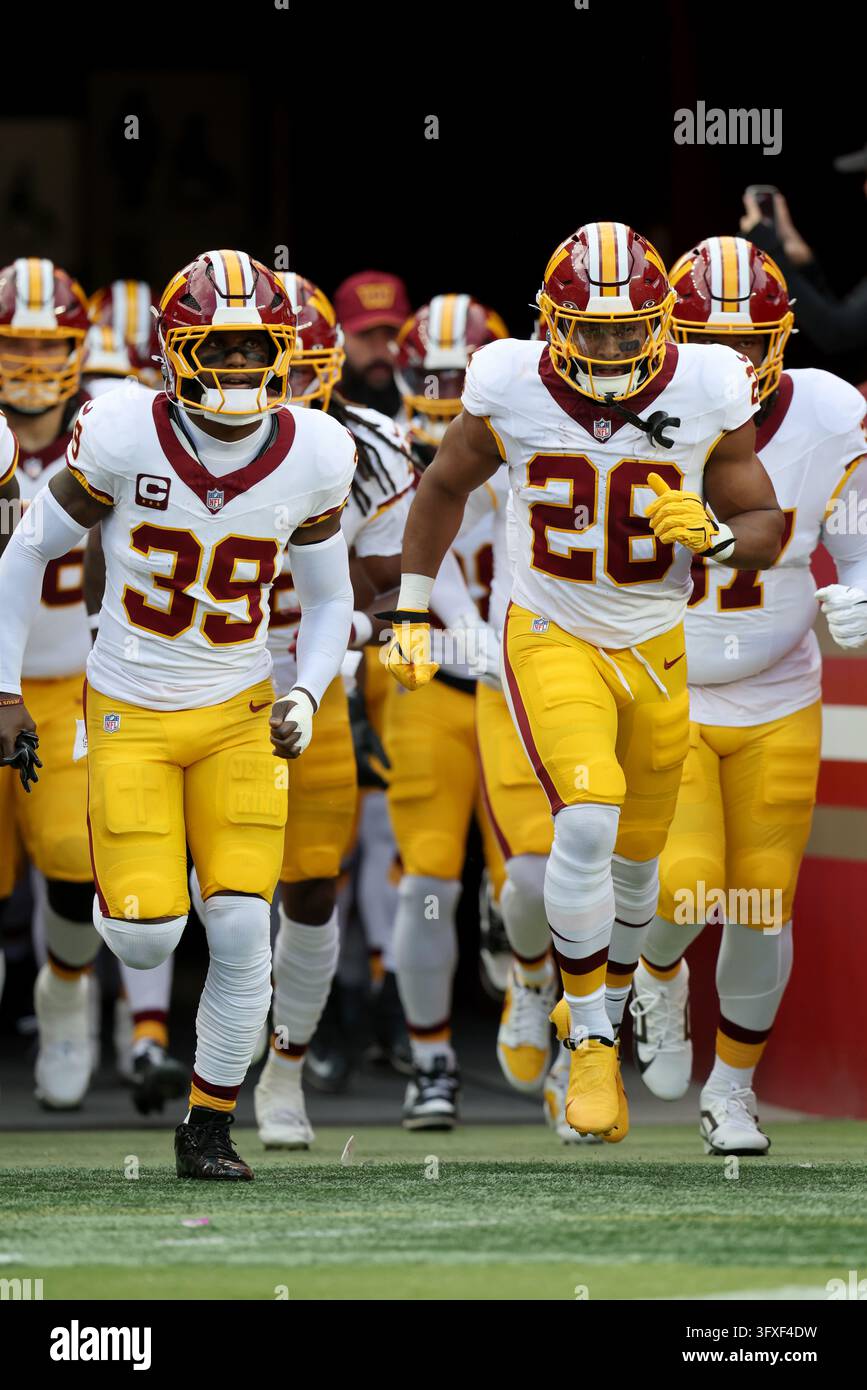 Washington Commanders running back Jeremy McNichols (26) leads the team ...