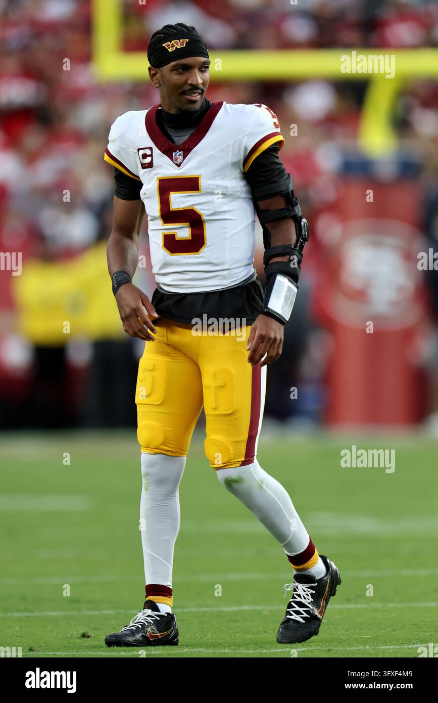 Washington Commanders quarterback Jayden Daniels (5) stands on the ...