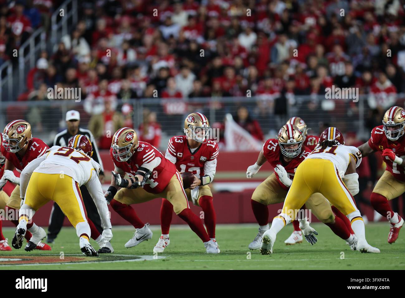 San Francisco 49ers quarterback Brock Purdy (13) runs a play during an ...