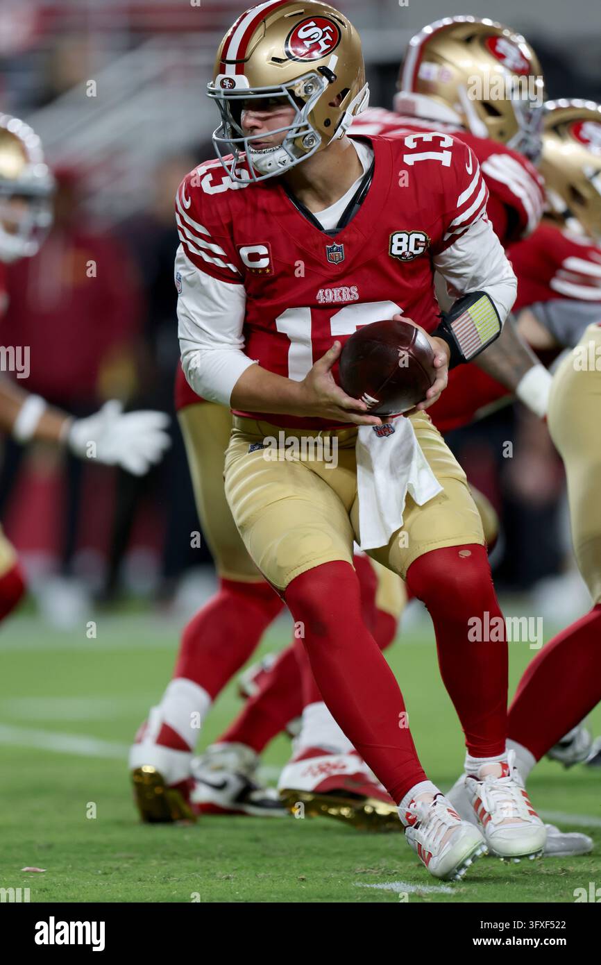San Francisco 49ers quarterback Brock Purdy (13) runs during an NFL ...