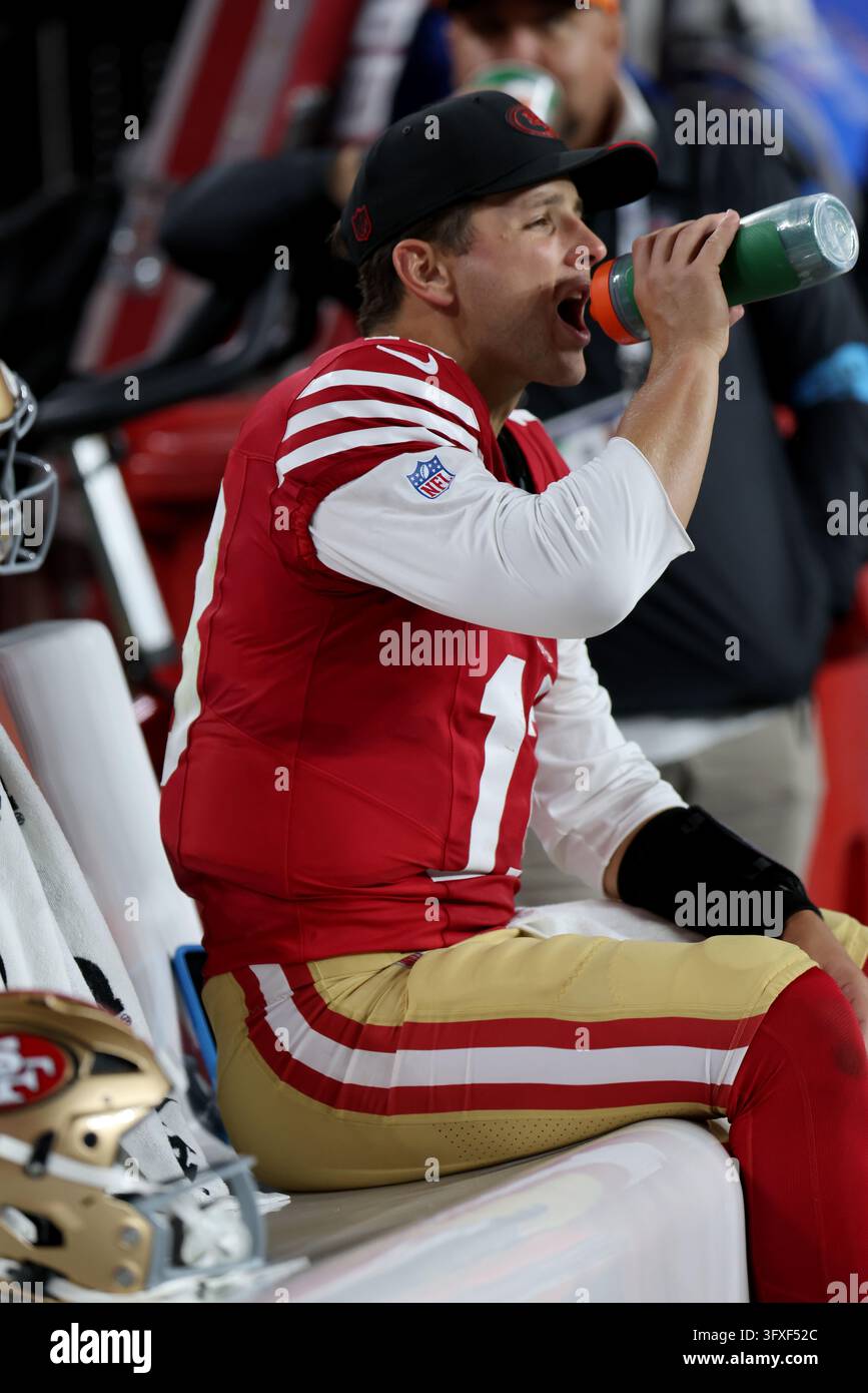 San Francisco 49ers quarterback Brock Purdy (13) drinks from a Gatorade ...