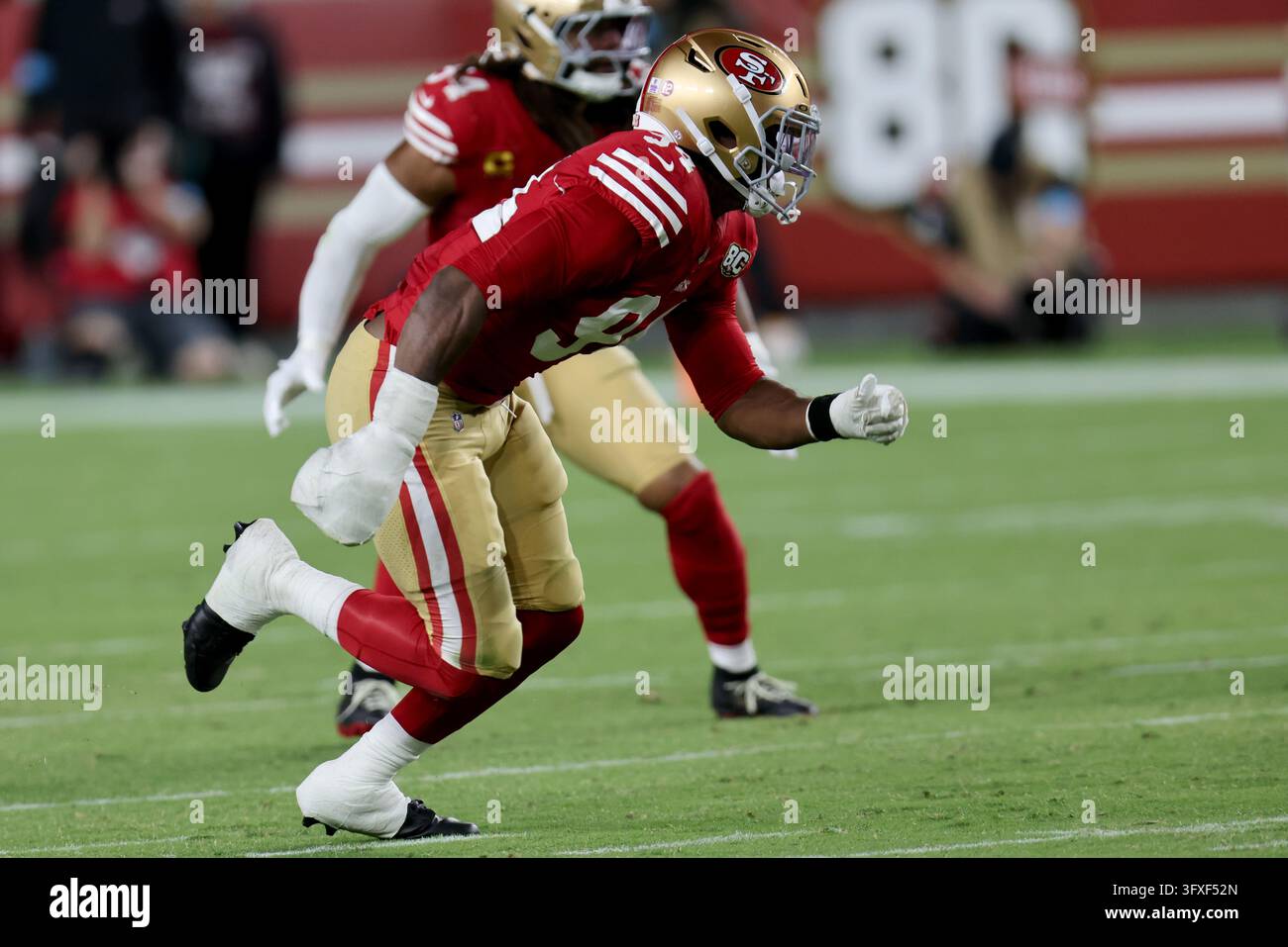 San Francisco 49ers defensive end Romello Height (94) rushes during an ...