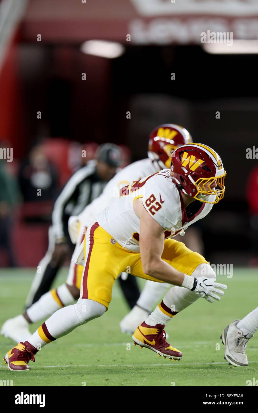 Football Block Image Vector Washington Commanders tight end Ben Sinnott (82) blocks during an NFL ...