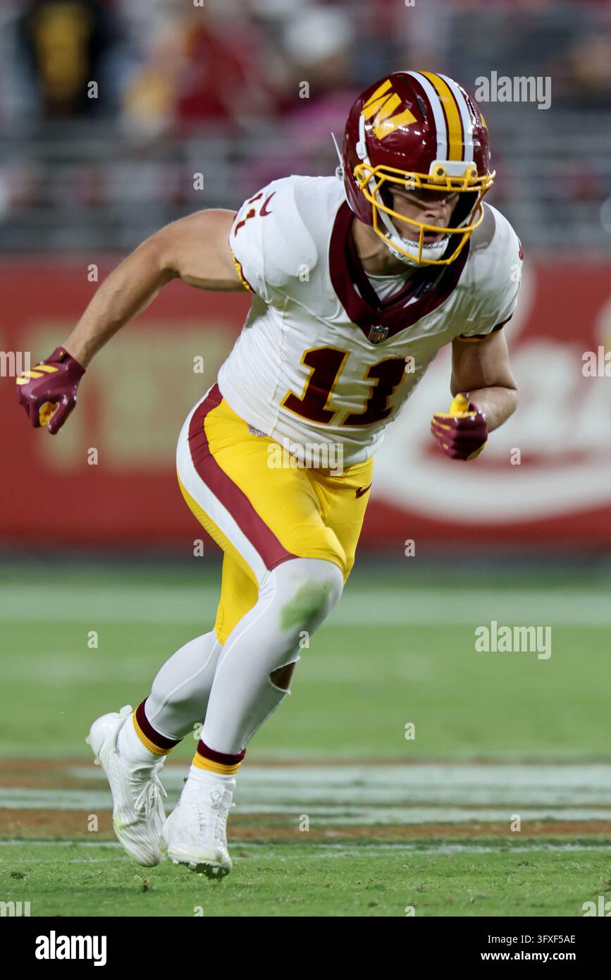 Washington Commanders New Roster Washington Commanders wide receiver Luke McCaffrey (11) runs during an ...