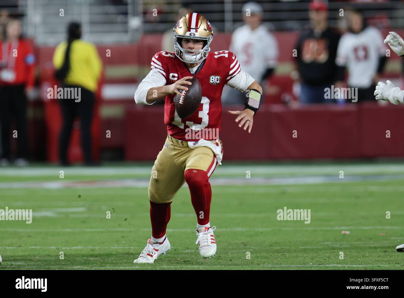 San Francisco 49ers quarterback Brock Purdy (13) runs during an NFL ...