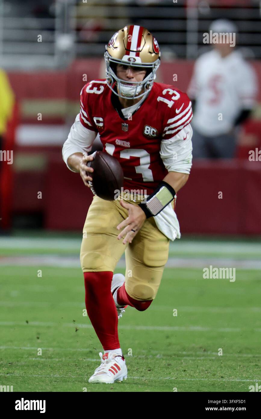 San Francisco 49ers quarterback Brock Purdy (13) runs during an NFL ...