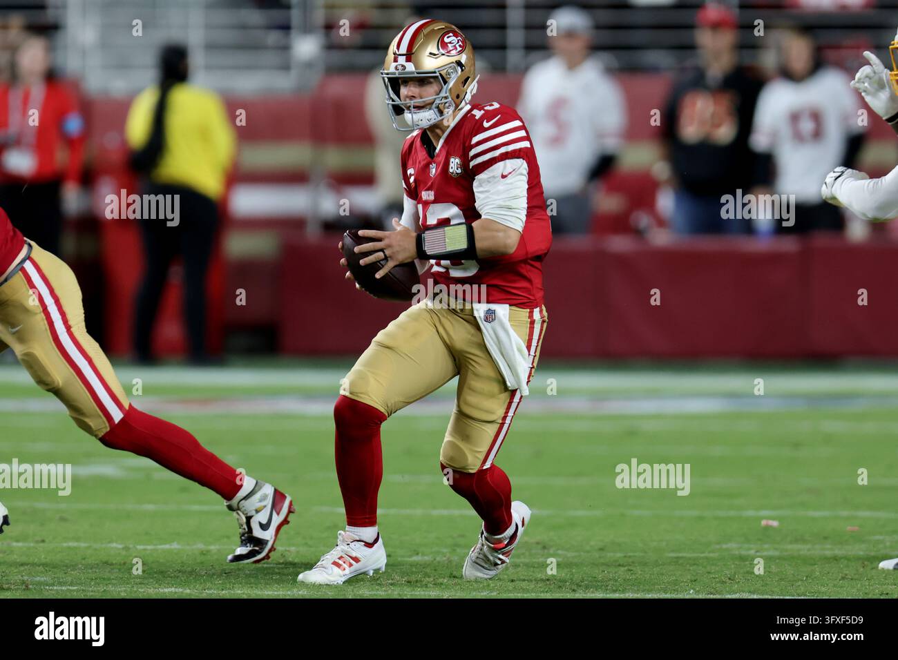 San Francisco 49ers quarterback Brock Purdy (13) runs during an NFL ...