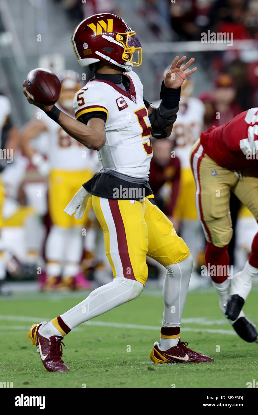 Washington Commanders quarterback Jayden Daniels (5) throws during an ...