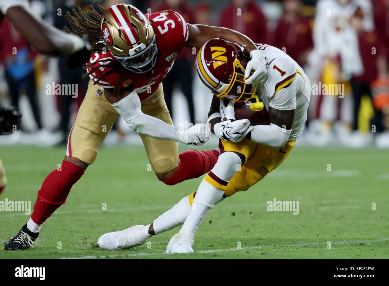 Washington Commanders New Roster San Francisco 49ers linebacker Fred Warner (54) tackles Washington ...